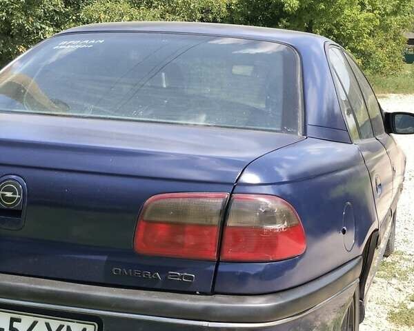 Синий Опель Омега, объемом двигателя 2 л и пробегом 256 тыс. км за 1600 $, фото 4 на Automoto.ua