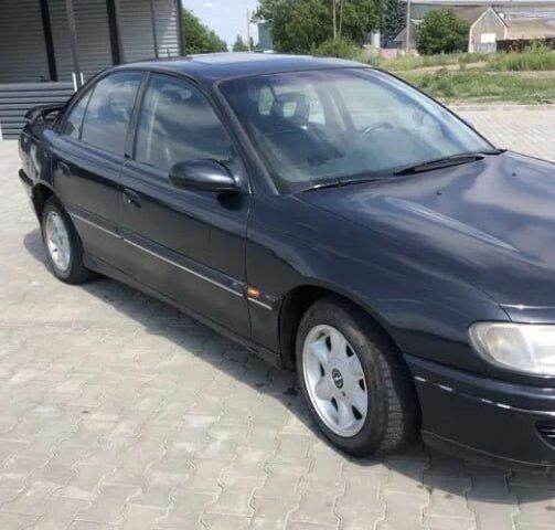 Синий Опель Омега, объемом двигателя 2.5 л и пробегом 3 тыс. км за 2300 $, фото 6 на Automoto.ua