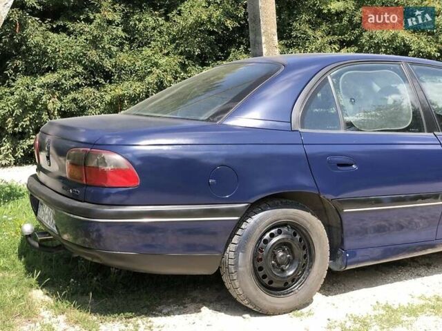 Синій Опель Омега, об'ємом двигуна 2 л та пробігом 256 тис. км за 1600 $, фото 13 на Automoto.ua