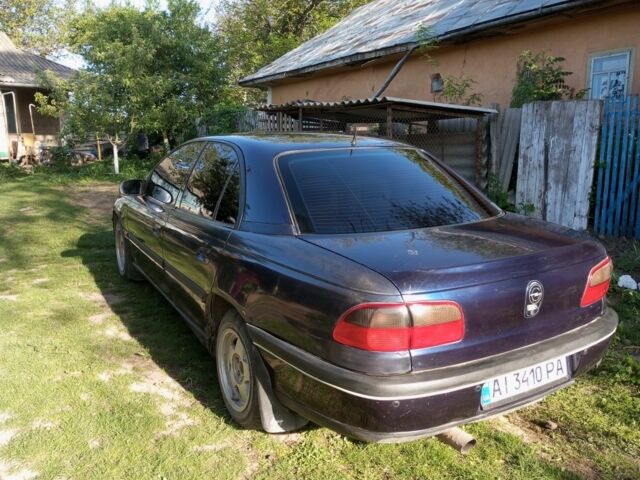 Синий Опель Омега, объемом двигателя 2 л и пробегом 200 тыс. км за 1200 $, фото 1 на Automoto.ua