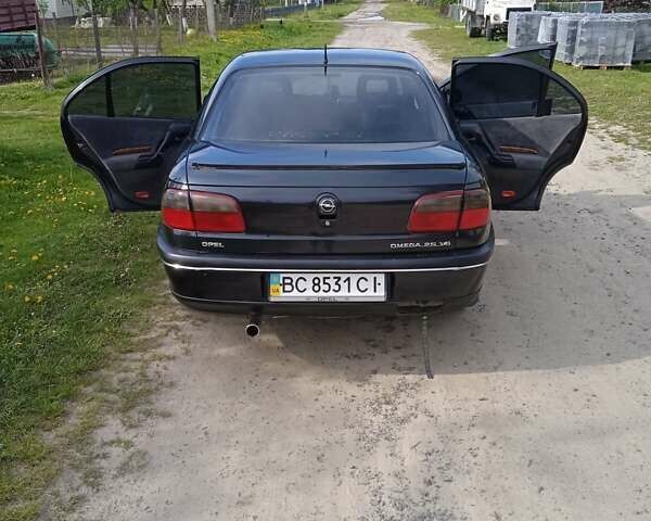 Синий Опель Омега, объемом двигателя 2.5 л и пробегом 297 тыс. км за 2000 $, фото 11 на Automoto.ua