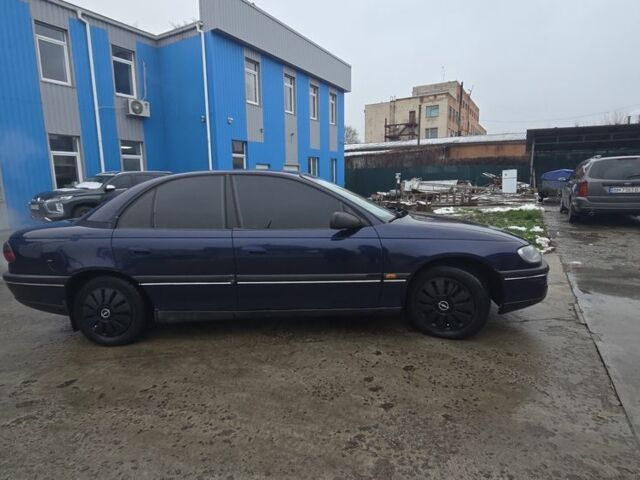 Синий Опель Омега, объемом двигателя 2 л и пробегом 345 тыс. км за 2800 $, фото 3 на Automoto.ua