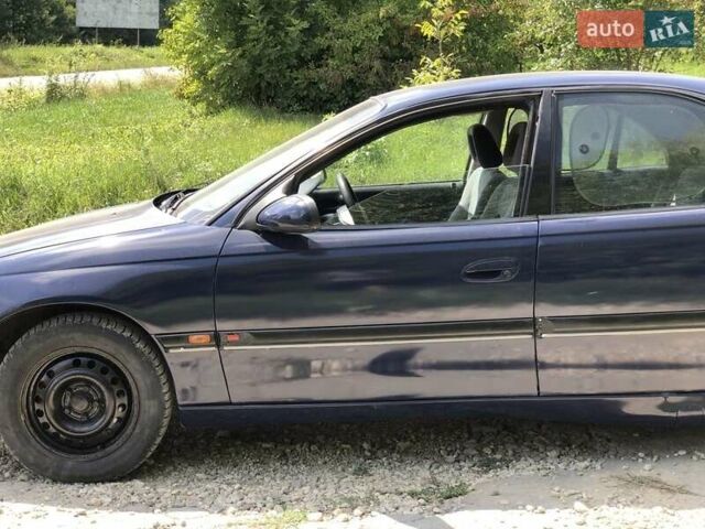 Синій Опель Омега, об'ємом двигуна 2 л та пробігом 256 тис. км за 1600 $, фото 17 на Automoto.ua