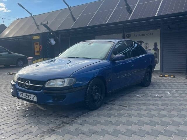 Синий Опель Омега, объемом двигателя 2 л и пробегом 300 тыс. км за 1036 $, фото 1 на Automoto.ua