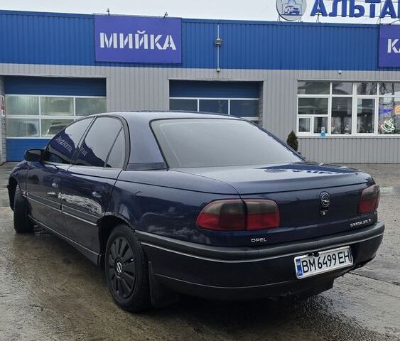 Синий Опель Омега, объемом двигателя 2 л и пробегом 345 тыс. км за 2800 $, фото 1 на Automoto.ua