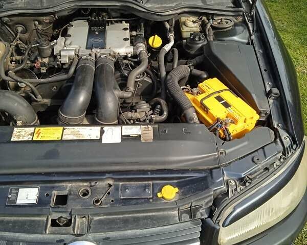 Синий Опель Омега, объемом двигателя 2.5 л и пробегом 297 тыс. км за 2000 $, фото 9 на Automoto.ua