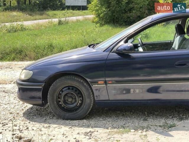 Синій Опель Омега, об'ємом двигуна 2 л та пробігом 256 тис. км за 1600 $, фото 22 на Automoto.ua