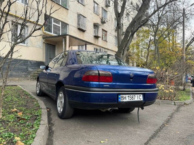 Синій Опель Омега, об'ємом двигуна 2 л та пробігом 301 тис. км за 3200 $, фото 4 на Automoto.ua