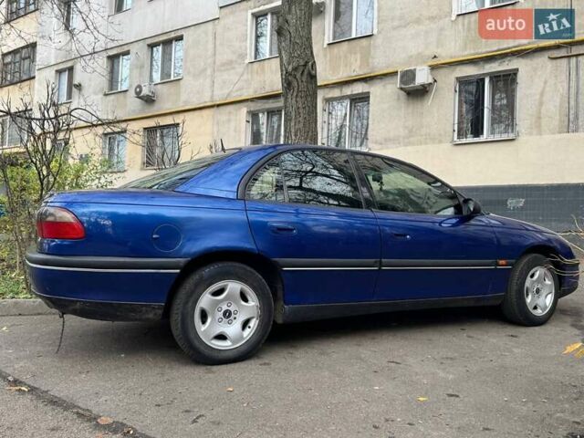 Синий Опель Омега, объемом двигателя 2 л и пробегом 301 тыс. км за 3200 $, фото 2 на Automoto.ua