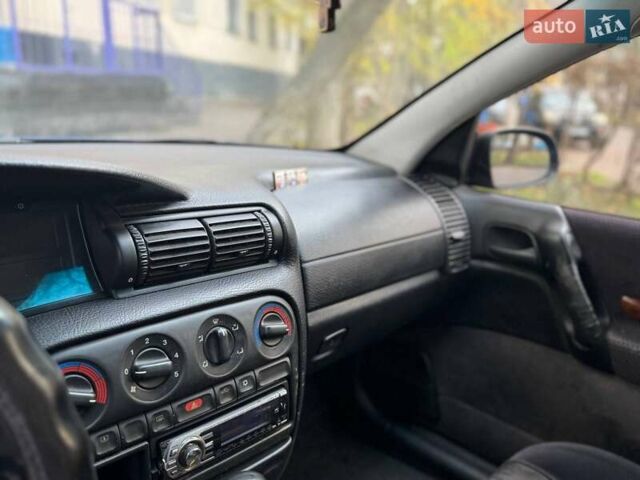 Синий Опель Омега, объемом двигателя 2 л и пробегом 301 тыс. км за 3200 $, фото 12 на Automoto.ua