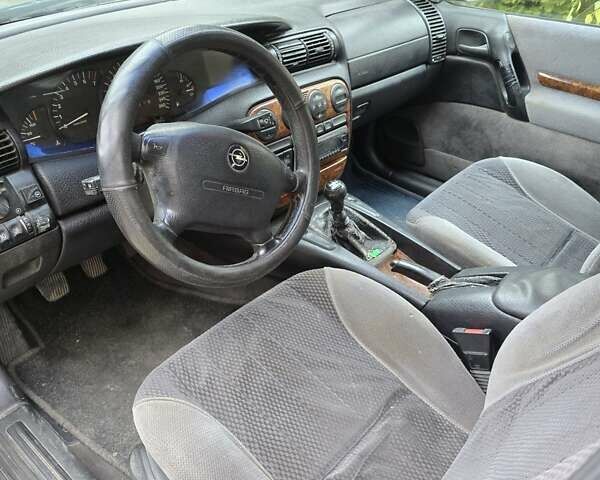 Опель Омега 1997 в Тернополе на Automoto.ua Синий Опель Омега, объемом двигателя 2.5 л и пробегом 296 тыс. км за 2700 $, фото 8 на Automoto.ua