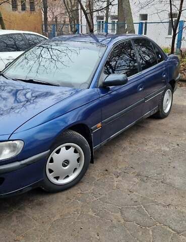 Синий Опель Омега, объемом двигателя 2 л и пробегом 300 тыс. км за 2000 $, фото 4 на Automoto.ua