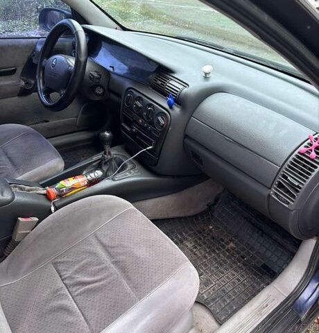 Синий Опель Омега, объемом двигателя 2 л и пробегом 280 тыс. км за 800 $, фото 5 на Automoto.ua