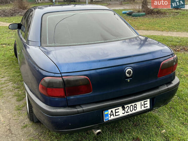 Синий Опель Омега, объемом двигателя 2 л и пробегом 320 тыс. км за 2577 $, фото 7 на Automoto.ua