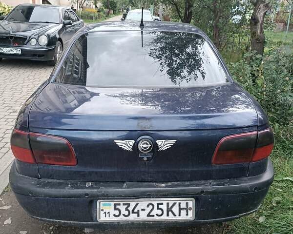 Синий Опель Омега, объемом двигателя 2.5 л и пробегом 350 тыс. км за 1450 $, фото 5 на Automoto.ua