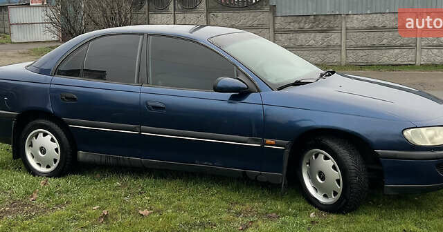 Синий Опель Омега, объемом двигателя 2 л и пробегом 320 тыс. км за 2577 $, фото 5 на Automoto.ua