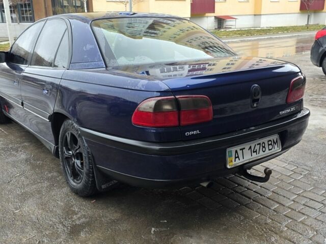 Синий Опель Омега, объемом двигателя 2 л и пробегом 380 тыс. км за 1350 $, фото 3 на Automoto.ua