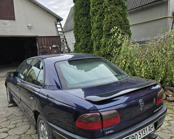 Синий Опель Омега, объемом двигателя 2.5 л и пробегом 296 тыс. км за 2700 $, фото 7 на Automoto.ua