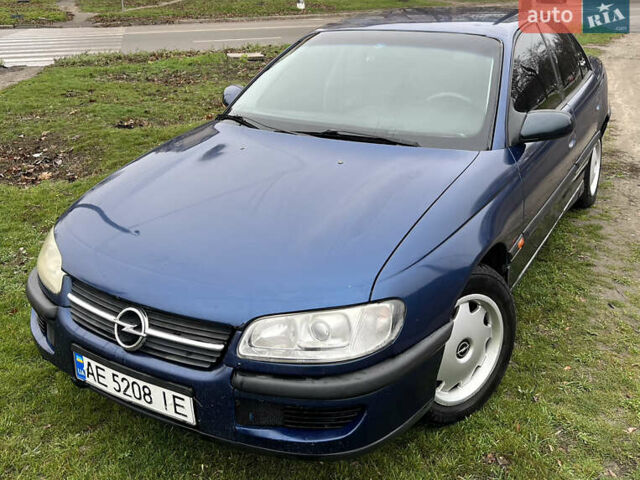 Синий Опель Омега, объемом двигателя 2 л и пробегом 320 тыс. км за 2577 $, фото 2 на Automoto.ua
