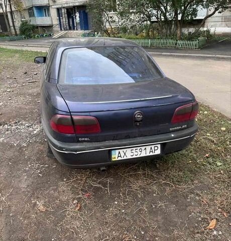 Синий Опель Омега, объемом двигателя 2 л и пробегом 280 тыс. км за 800 $, фото 2 на Automoto.ua