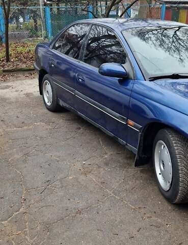 Синий Опель Омега, объемом двигателя 2 л и пробегом 300 тыс. км за 2000 $, фото 5 на Automoto.ua