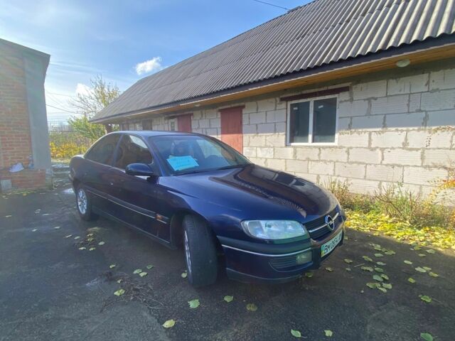 Синий Опель Омега, объемом двигателя 2 л и пробегом 400 тыс. км за 1700 $, фото 9 на Automoto.ua