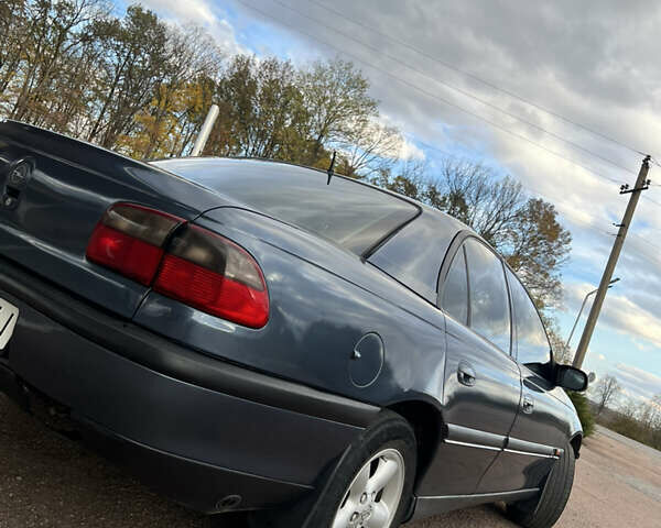 Опель Омега 1998 в Бучаче на Automoto.ua Синий Опель Омега, объемом двигателя 2 л и пробегом 300 тыс. км за 2600 $, фото 4 на Automoto.ua