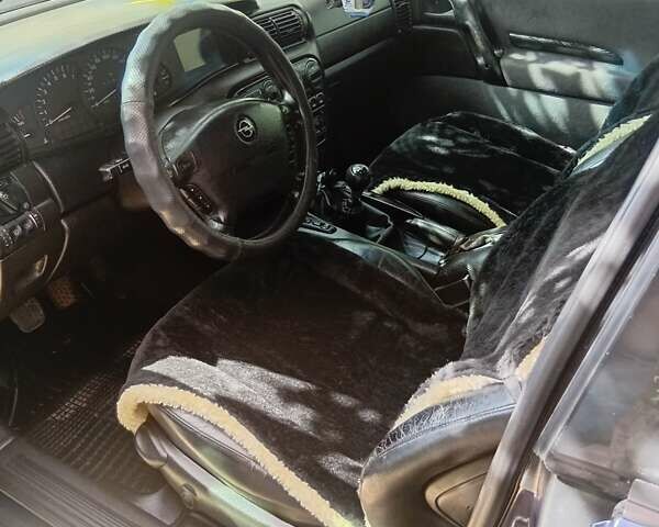 Синій Опель Омега, об'ємом двигуна 2.5 л та пробігом 432 тис. км за 2750 $, фото 10 на Automoto.ua