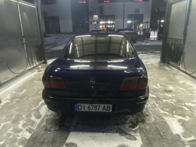 Синій Опель Омега, об'ємом двигуна 2 л та пробігом 345 тис. км за 1700 $, фото 2 на Automoto.ua