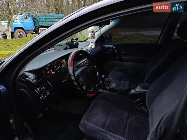 Синий Опель Омега, объемом двигателя 2 л и пробегом 260 тыс. км за 2400 $, фото 5 на Automoto.ua