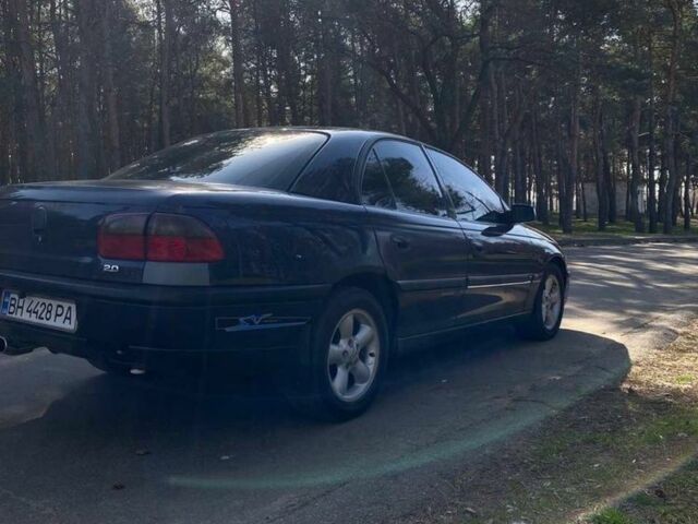 Синій Опель Омега, об'ємом двигуна 2 л та пробігом 3 тис. км за 2450 $, фото 2 на Automoto.ua