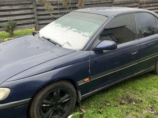 Синій Опель Омега, об'ємом двигуна 2 л та пробігом 360 тис. км за 1700 $, фото 5 на Automoto.ua