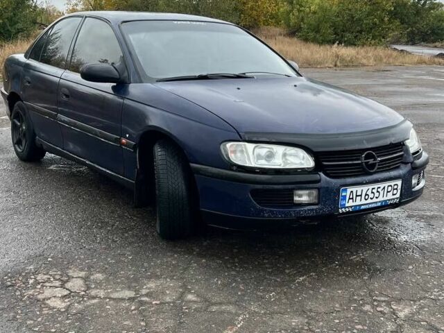 Синий Опель Омега, объемом двигателя 2 л и пробегом 200 тыс. км за 1334 $, фото 5 на Automoto.ua