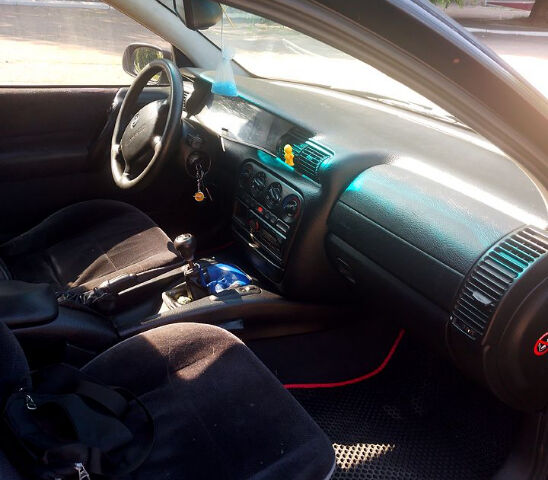 Синій Опель Омега, об'ємом двигуна 2 л та пробігом 123 тис. км за 3000 $, фото 7 на Automoto.ua