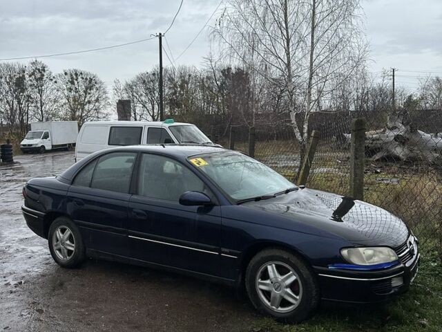 Синий Опель Омега, объемом двигателя 2 л и пробегом 200 тыс. км за 850 $, фото 1 на Automoto.ua