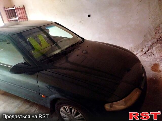 Синий Опель Омега, объемом двигателя 1.8 л и пробегом 100 тыс. км за 2500 $, фото 1 на Automoto.ua