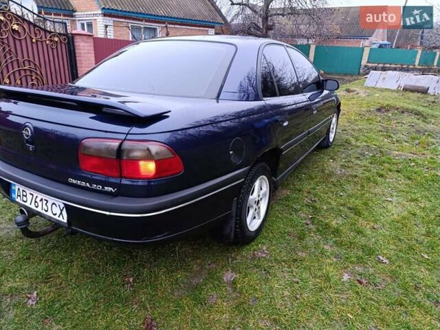 Синий Опель Омега, объемом двигателя 2 л и пробегом 260 тыс. км за 2400 $, фото 4 на Automoto.ua