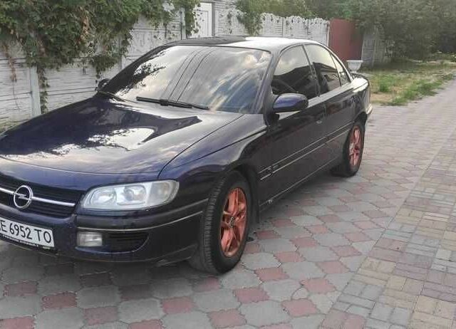 Синий Опель Омега, объемом двигателя 2.5 л и пробегом 385 тыс. км за 3400 $, фото 10 на Automoto.ua