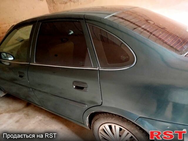 Синий Опель Омега, объемом двигателя 1.8 л и пробегом 100 тыс. км за 2500 $, фото 7 на Automoto.ua