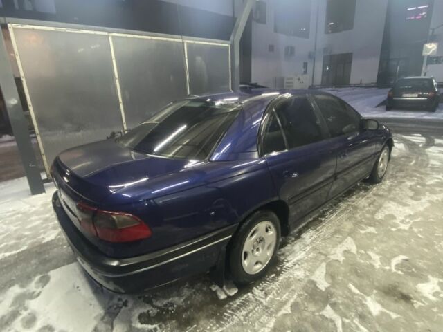 Синій Опель Омега, об'ємом двигуна 2 л та пробігом 345 тис. км за 1700 $, фото 6 на Automoto.ua