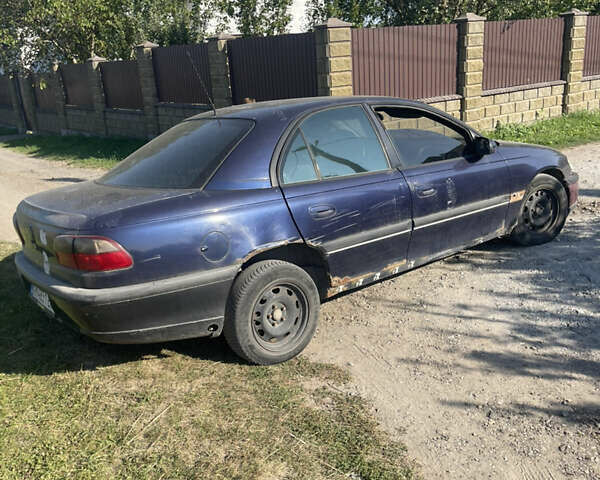 Синій Опель Омега, об'ємом двигуна 2.5 л та пробігом 327 тис. км за 1200 $, фото 2 на Automoto.ua