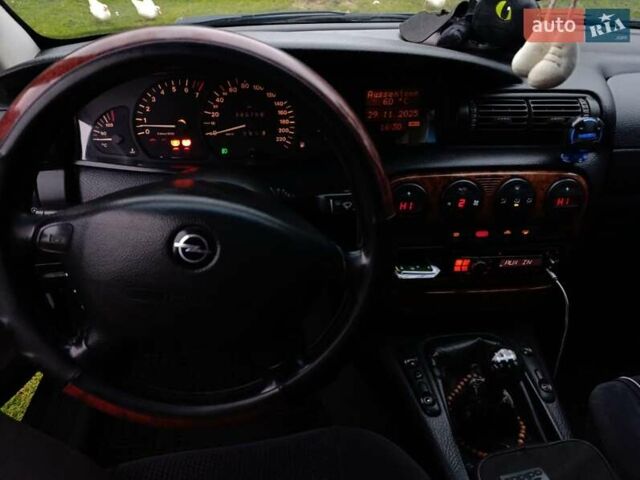 Синий Опель Омега, объемом двигателя 2 л и пробегом 260 тыс. км за 2400 $, фото 8 на Automoto.ua