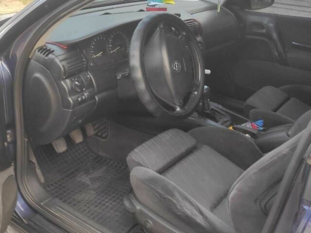 Синий Опель Омега, объемом двигателя 2.5 л и пробегом 385 тыс. км за 3400 $, фото 5 на Automoto.ua