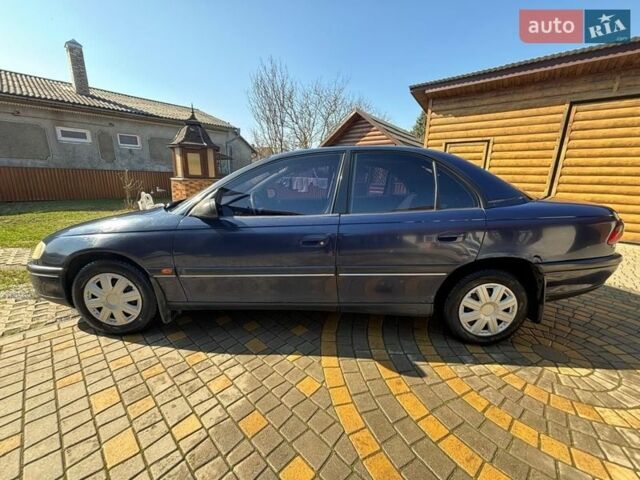 Синий Опель Омега, объемом двигателя 2 л и пробегом 370 тыс. км за 2000 $, фото 11 на Automoto.ua