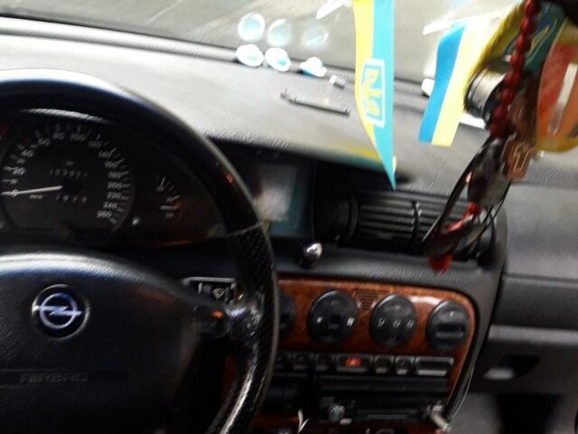 Синій Опель Омега, об'ємом двигуна 2.5 л та пробігом 250 тис. км за 2300 $, фото 9 на Automoto.ua