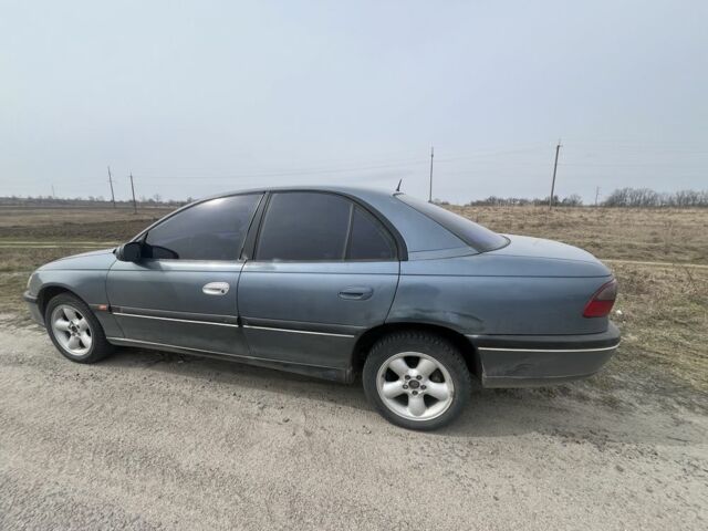 Синий Опель Омега, объемом двигателя 2 л и пробегом 438 тыс. км за 1700 $, фото 3 на Automoto.ua