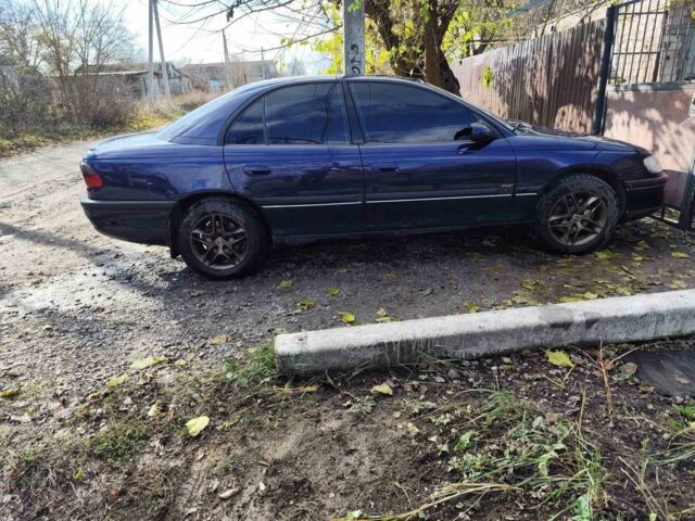 Синий Опель Омега, объемом двигателя 2.5 л и пробегом 385 тыс. км за 3400 $, фото 7 на Automoto.ua