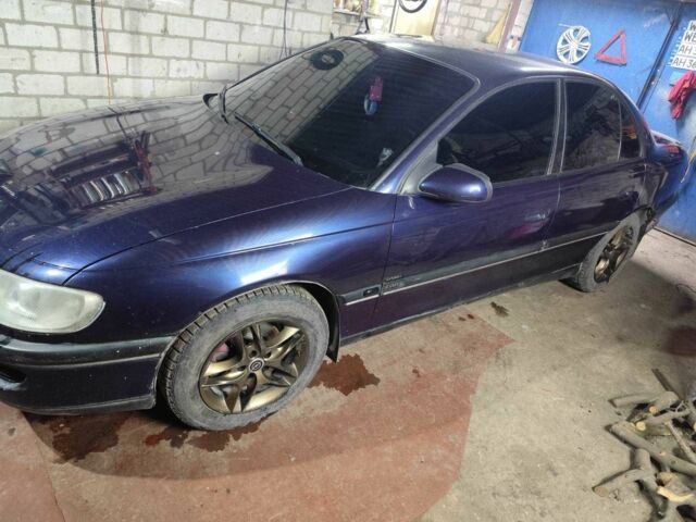 Синий Опель Омега, объемом двигателя 2.5 л и пробегом 385 тыс. км за 3400 $, фото 8 на Automoto.ua