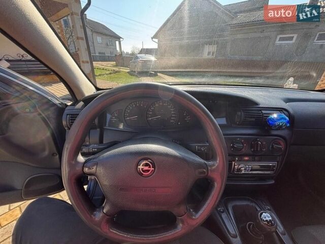 Синий Опель Омега, объемом двигателя 2 л и пробегом 370 тыс. км за 2000 $, фото 15 на Automoto.ua