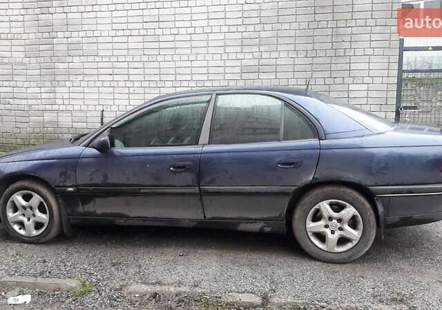 Синій Опель Омега, об'ємом двигуна 2.5 л та пробігом 250 тис. км за 2300 $, фото 3 на Automoto.ua